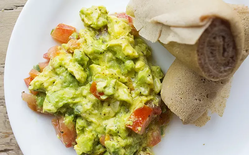 Avocado salad with tomatoes, peppers, onion and olive oil. - PHOTO BY MABEL SUEN