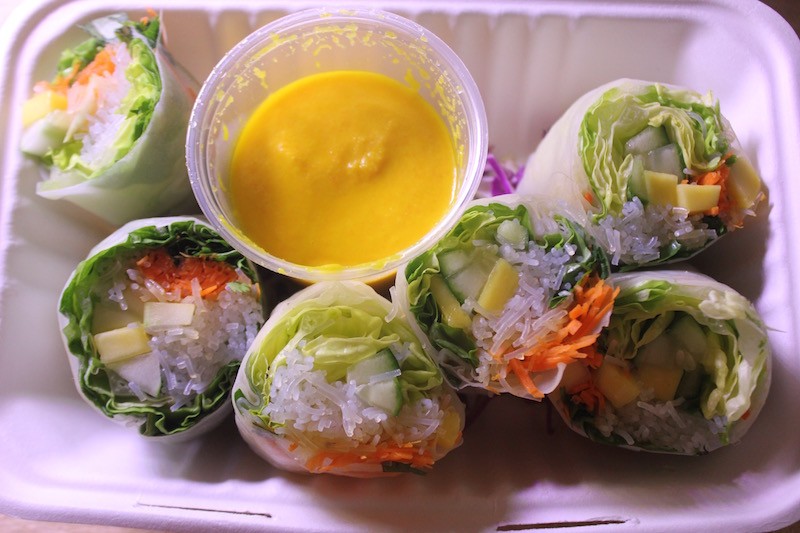 Spring rolls are packed with fresh vegetables and come with a carrot-sesame sauce. - PHOTO BY SARAH FENSKE