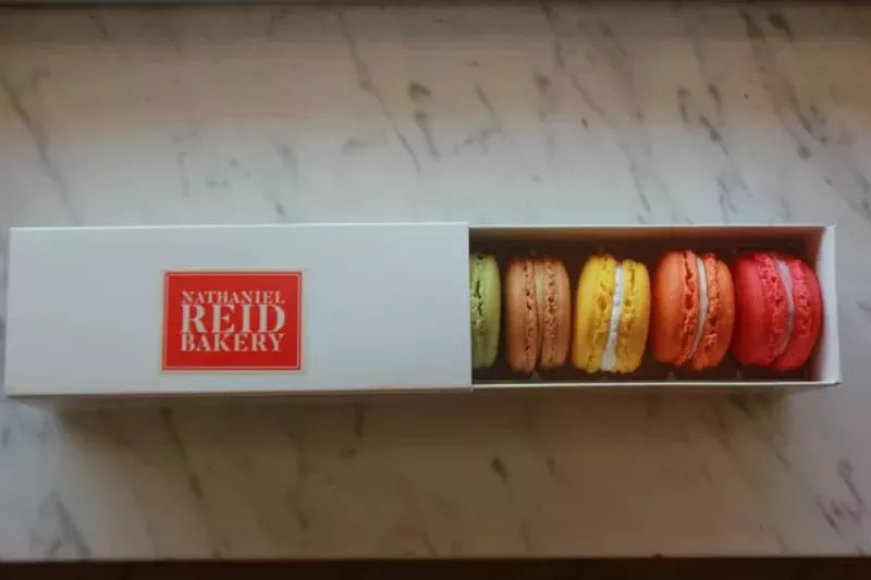 Colorful macarons made by award-winning chef Reid. - CHERYL BAEHR