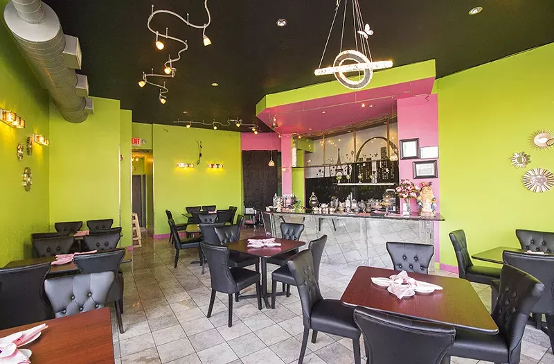 The dining room is brightly painted and friendly. - PHOTO BY MABEL SUEN
