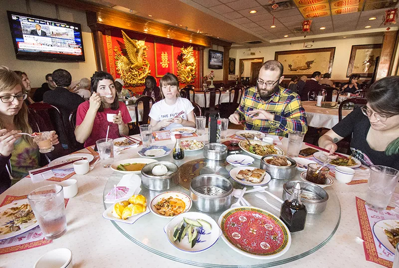 Friends enjoy a dim sum feast. - PHOTO BY MABEL SUEN