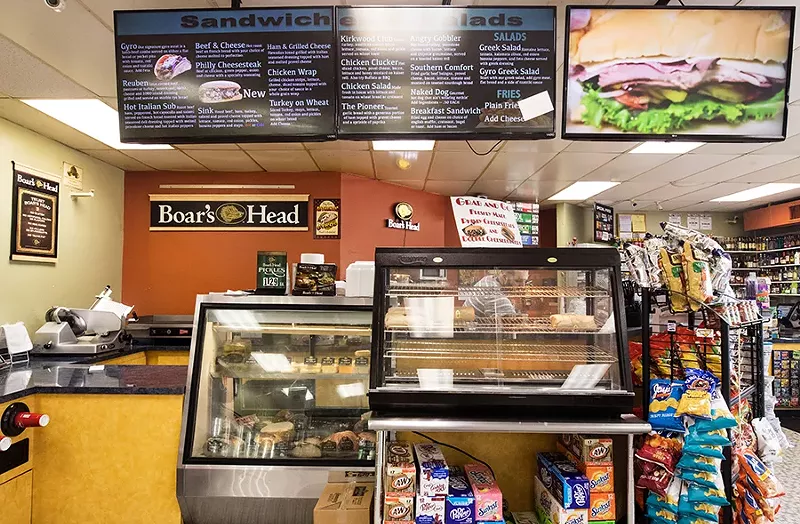 The menu features sandwiches and salads. - MABEL SUEN