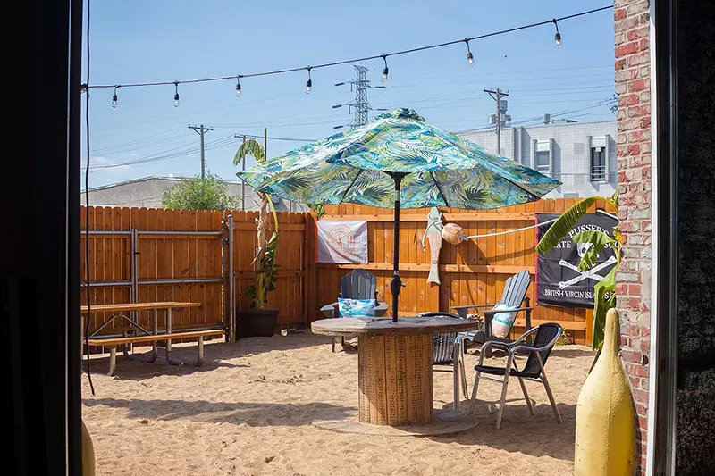 The back patio may be far from the Caribbean but still offers a beachy getaway to enjoy a vacation-style cocktail. - MABEL SUEN