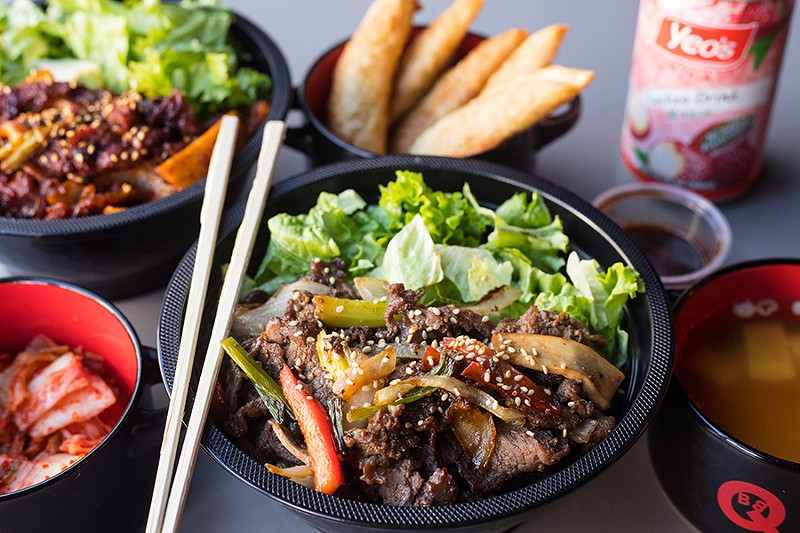 At BoBQ, the spicy pork bowl tops perfectly cooked rice with succulent and fiery sliced pork. - MABEL SUEN