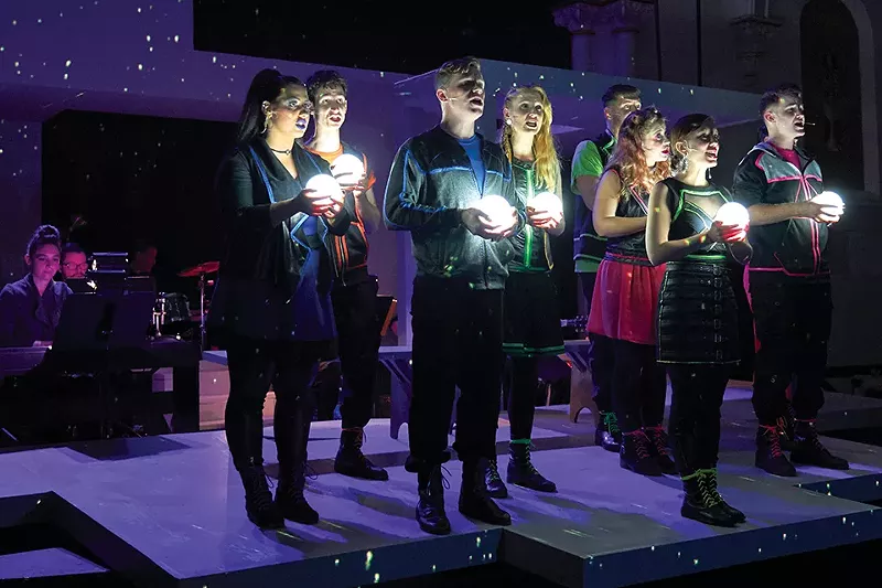 The ensemble and their glowing pinballs. - DAN DONOVAN