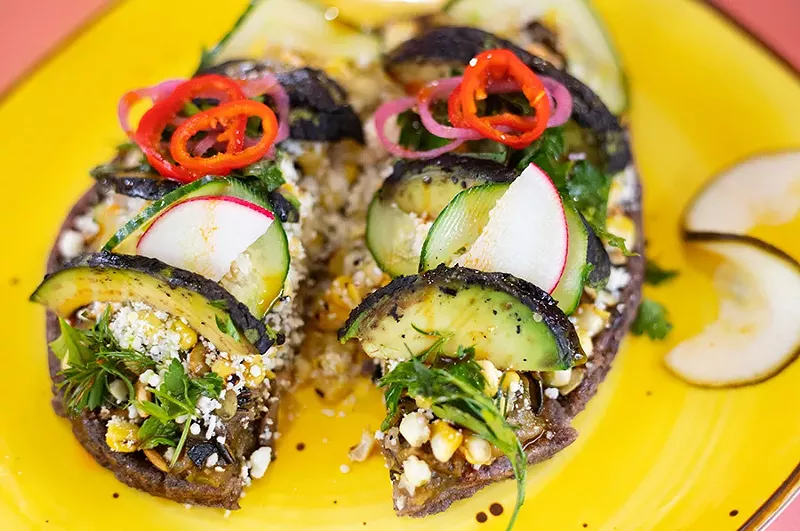 Huarache de maiz azul with black garlic, charred zucchini, beans, queso fresco, pepitas and charred avocado. - MABEL SUEN