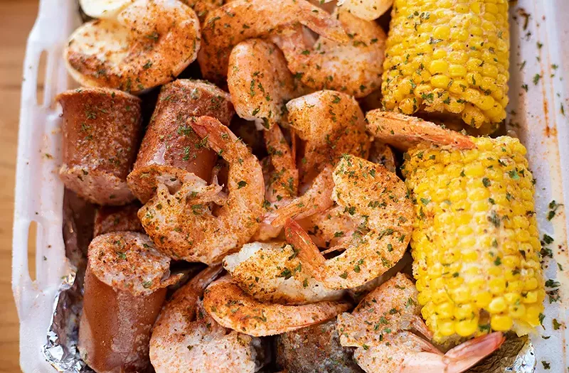 Chef-owner Flavia Moore knows how to cook seafood, as evidenced by her shell-on shrimp, which are plump and tender. - MABEL SUEN