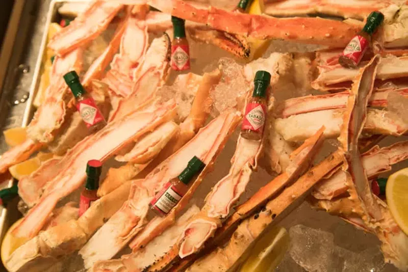 Crab legs served at the grand opening. - TRENTON ALMGREN-DAVIS