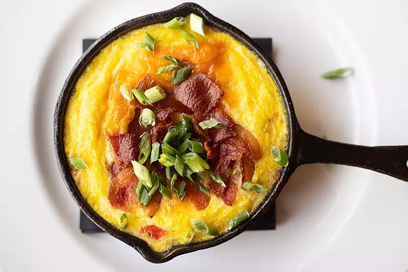 The skillet frittata with hash browns, eggs, cheddar cheese, roasted red peppers, caramelized onions and bacon. - MABEL SUEN