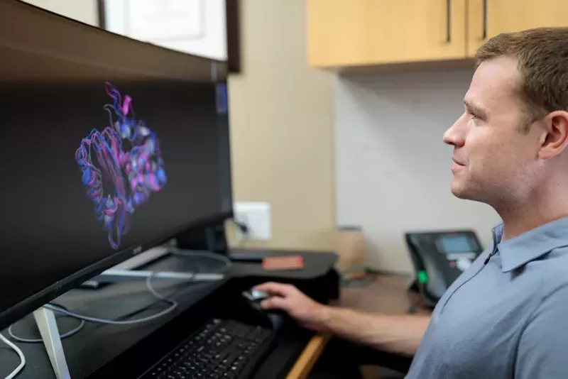 Dr. Gregory Bowman’s team uses a distributed computing network to make massive computational problems more manageable. - MATT MILLER/WASHINGTON UNIVERSITY