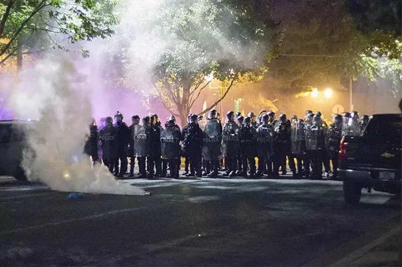 Police fired tear gas canisters into the streets of the Central West End on September 15, 2017. - DANNY WICENTOWSKI