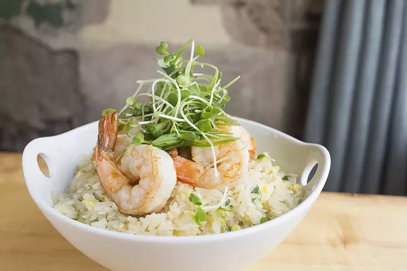Coconut fried rice with green onion, garlic, scrambled egg, shrimp and microgreens. - PHOTO BY MABEL SUEN