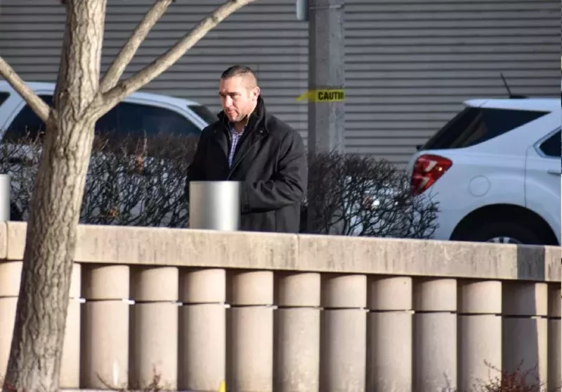 Ex-St. Louis cop Dustin Boone walks into federal court in 2018. - DOYLE MURPHY