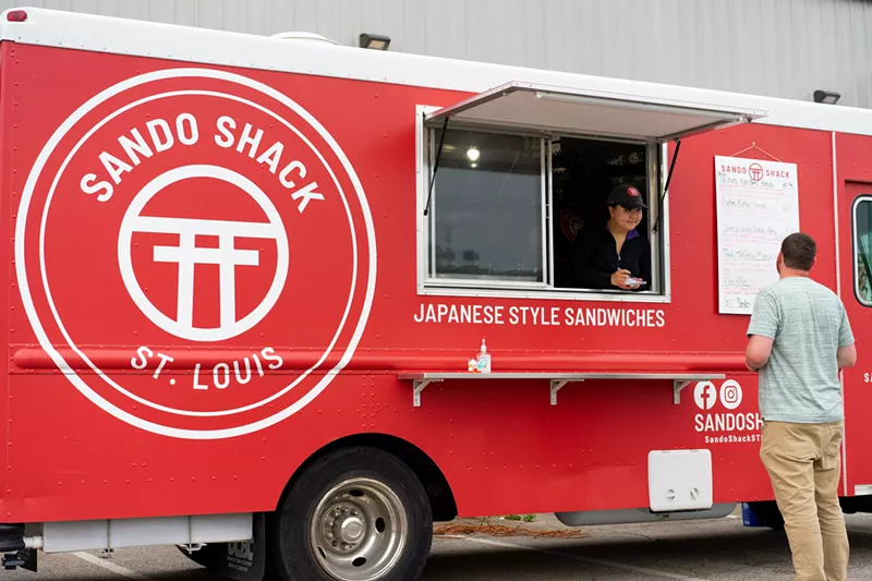 Amy Guo takes an order just after the truck opened for the evening. - HOLDEN HINDES