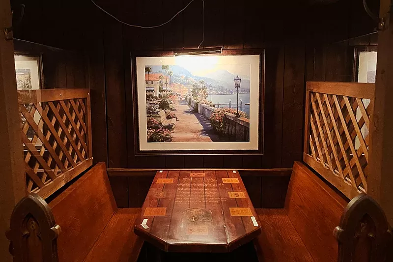 The initial vision for Balducci’s was to create a wine festival-like environment with booths themed individually for wine regions around the globe. Inscriptions in the wood include descriptions of wines, labels and facts about the region. - ANDY PAULISSEN