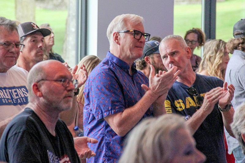 Jim Hoft, aka The Gateway Pundit, (center) earlier this year in the crowd at a campaign rally for Eric Greitens. - DANNY WICENTOWSKI