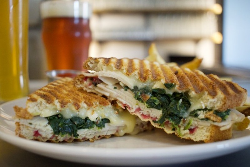 The turkey and brie sandwich consists of roast turkey, brie cheese, spinach and cranberry spread. - CHERYL BAEHR