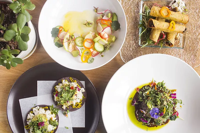 A selection of dishes from Nixta: ceviche, flautas, crab tostadas and mole. - MABEL SUEN