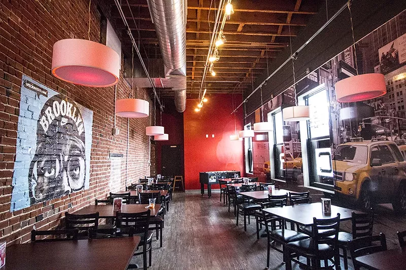 Co-owner Dave Holman's talent for design shows in the space, which includes murals and large modern lanterns. - PHOTO BY MABEL SUEN