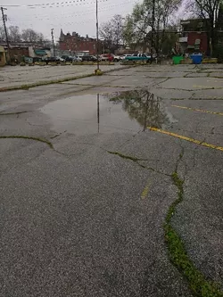 The old bank property owned by the Gravois Park Neighborhood Association remains a dead zone in a neighborhood bustling with redevelopment and renewal.