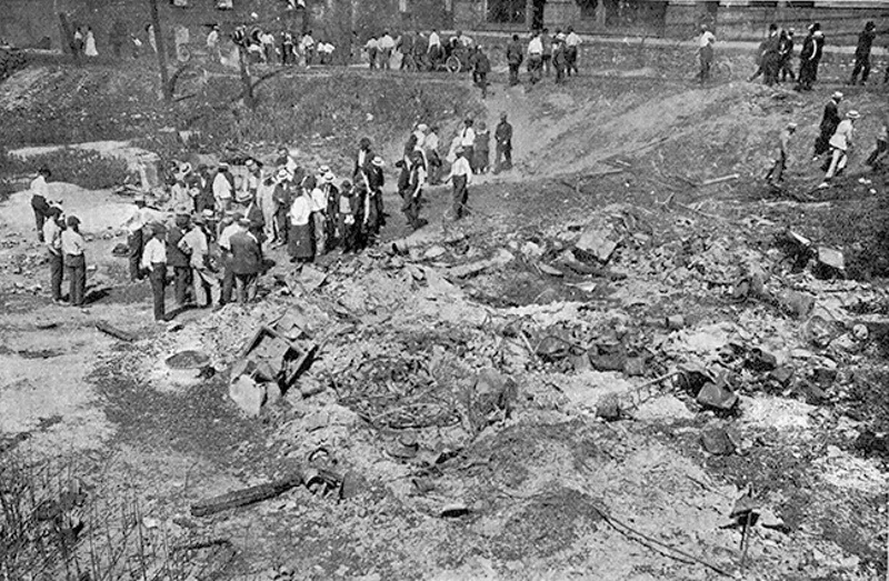 White rioters burned hundreds of black-owned homes, in many cases shooting residents who fled the flames. - PHOTO VIA THE CRISIS