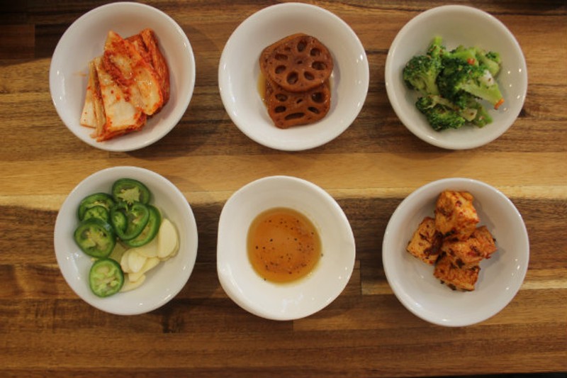 A selection of banchan, or complimentary side dishes. - CHERYL BAEHR
