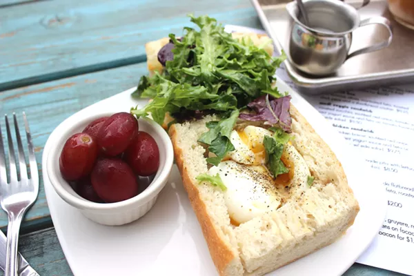 The workday sandwich with soft-boiled egg and greens on baguette. - PHOTO BY LAUREN MILFORD
