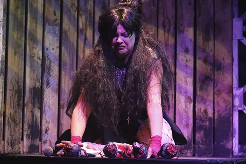 Lizzie Borden (Anna Skidis Vargas) contemplates dead birds and murder. - JILL RITTER LINDBERG