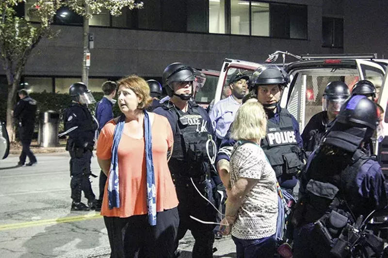 A total of 143 people were arrested on October 3 after they blocked a section of Interstate 64/40. - DOYLE MURPHY