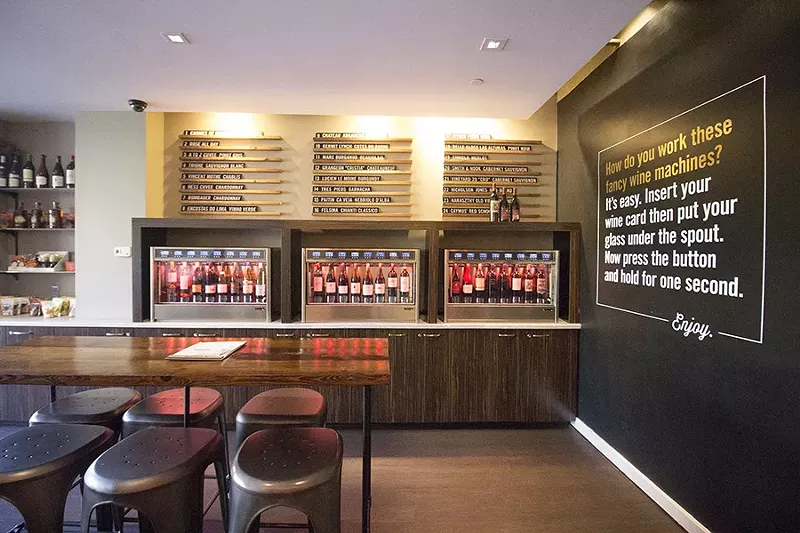 A self-pour wine system gives customers their pick of glasses. - MABEL SUEN