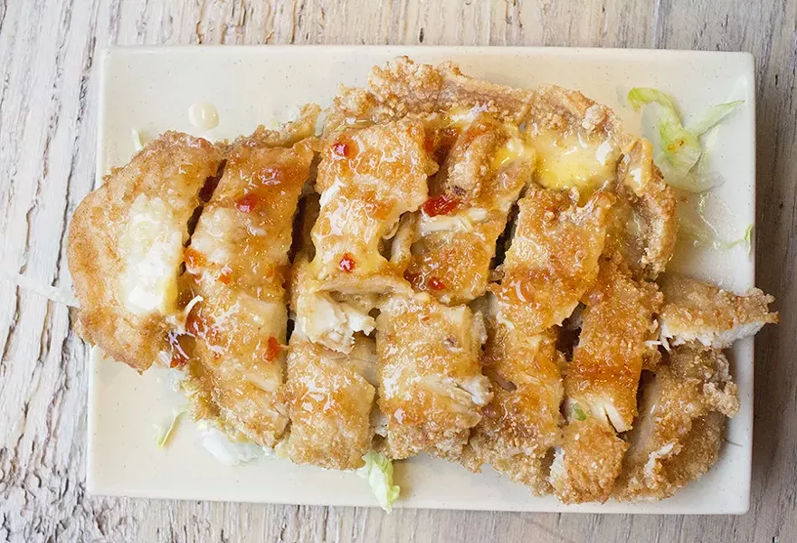 The "Volcano Chicken" combines fried chicken with cheese. - MABEL SUEN
