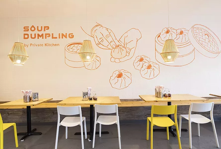 The dining room offers no frills. - MABEL SUEN