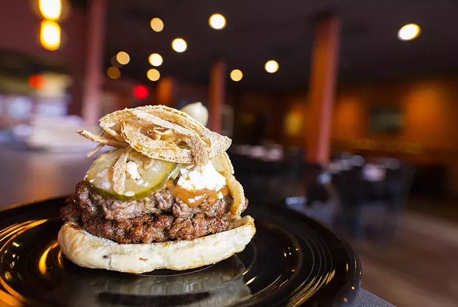The grass-fed burger, a riff on an everything bagel, is a misfire. - MABEL SUEN