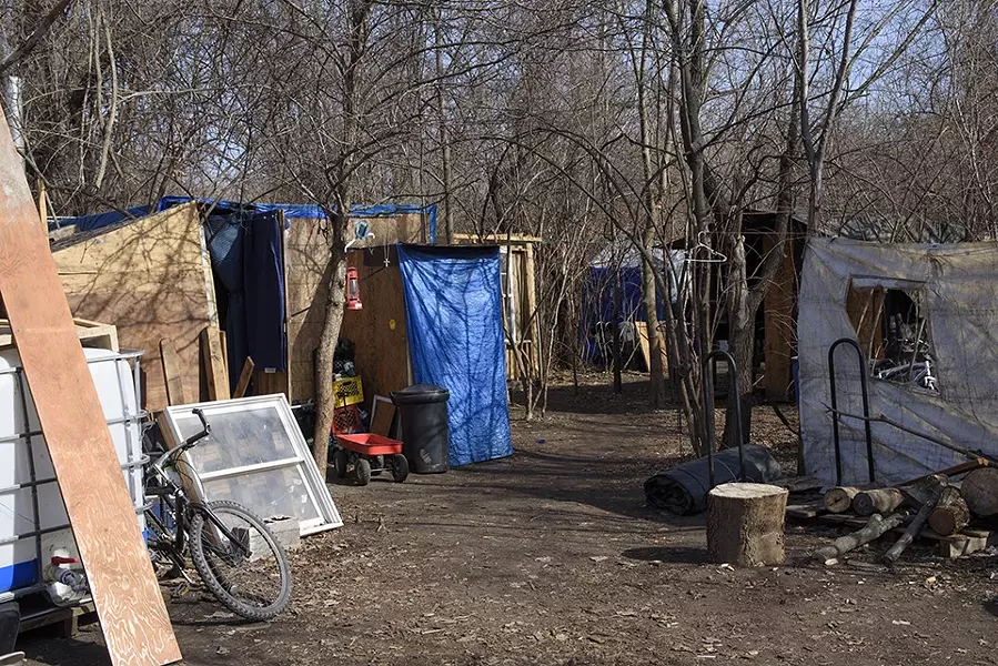 The camp on the east side is just one of many solutions that local homeless people have cobbled together this winter. - NICK SCHNELLE