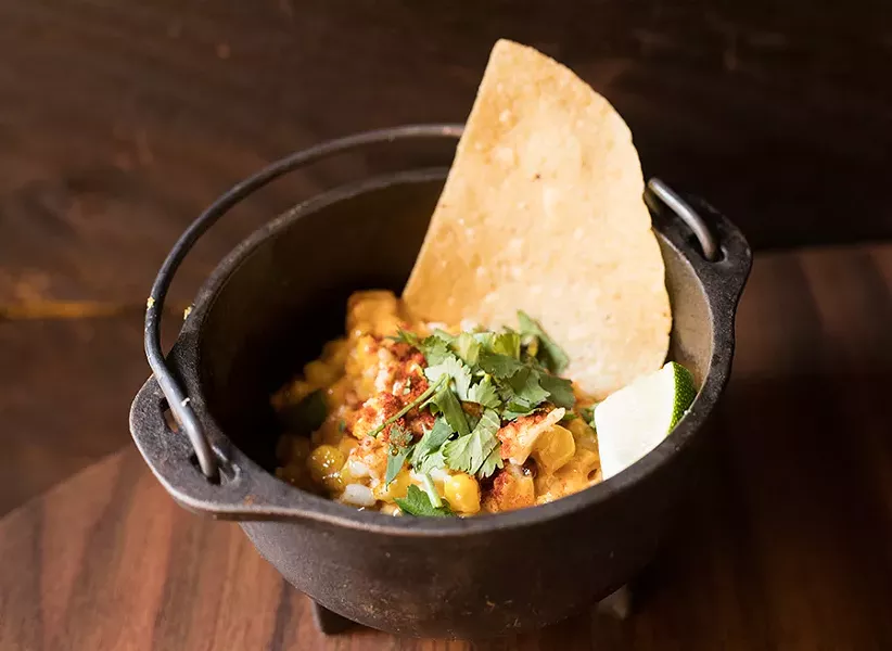 Street corn dip served with chips is already a customer favorite. - MABEL SUEN