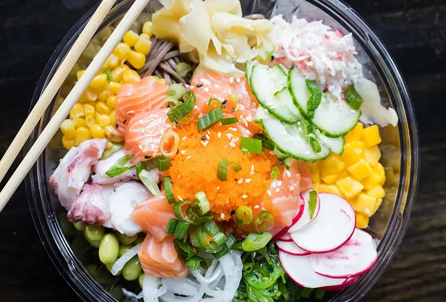 Soba noodles prove an alternative to rice. They're shown here topped with salmon, octopus, corn, ginger, mango, seaweed salad, onion, edamame and crab meat. - MABEL SUEN