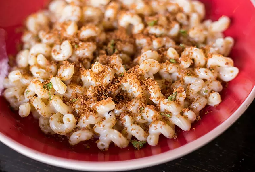 Mac and cheese uses cavatappi noodles and a four-cheese blend. - MABEL SUEN
