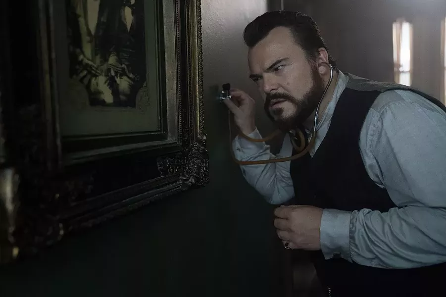 Uncle Jonathan (Jack Black) listens for the tell-tale sound of doomsday. - (C) STORYTELLER DISTRIBUTION CO., LLC