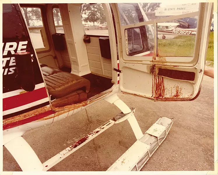 Barklage kept several photos in his scrapbook showing his helicopter covered in Oswald's blood. - ALLEN BARKLAGE PERSONAL EFFECTS