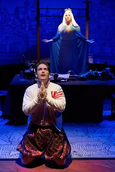 Hamlet (Casey Boland, kneeling) receives a vision of Mary (Caitlin Mickey). - PROPHOTOSTL.COM