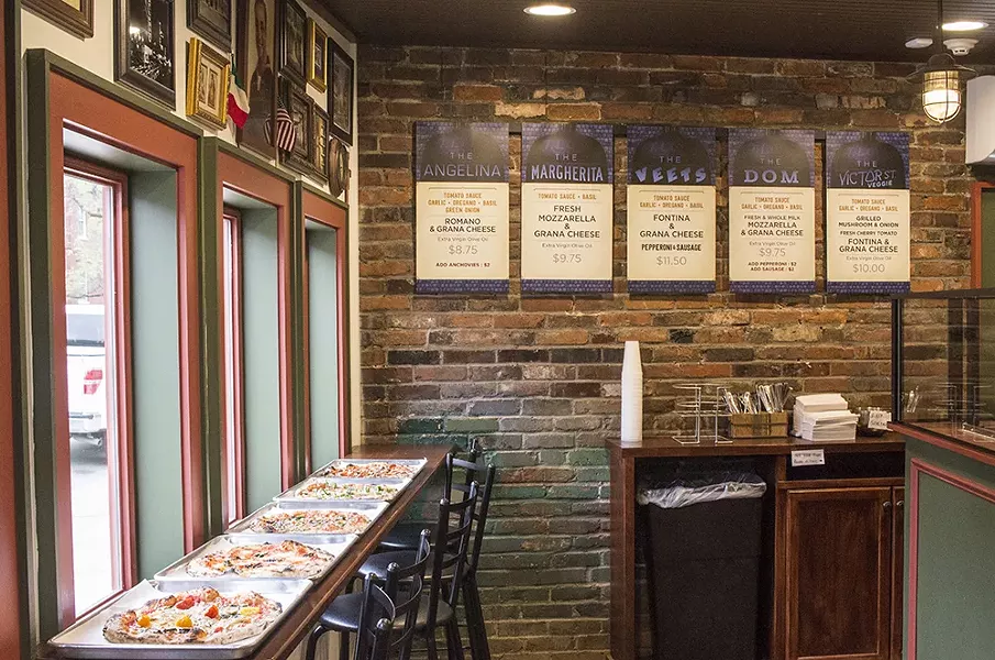 The interior of Melo's Pizzeria is tiny. - MABEL SUEN