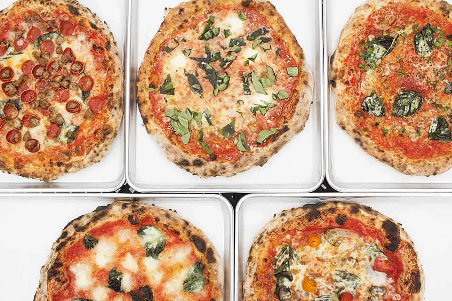 Melo's offers just five different pies, along with an assortment of craft beer. - MABEL SUEN