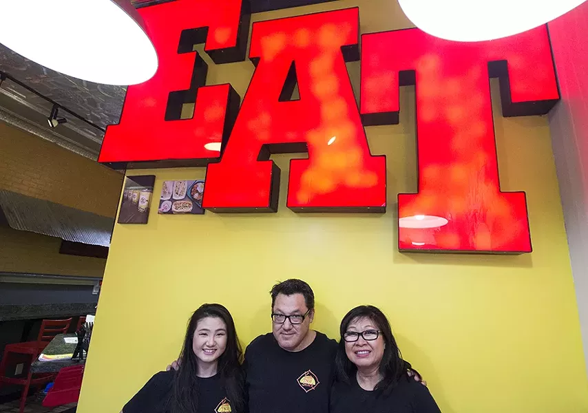 Olivia Shackelford, Mark Shackelford and Sue Wong-Shackelford. - PHOTO BY MABEL SUEN