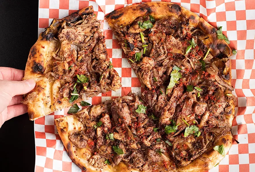 Musakhan is a Palestinian dish composed of shredded chicken baked with onions, sumac, allspice and saffron. - MABEL SUEN