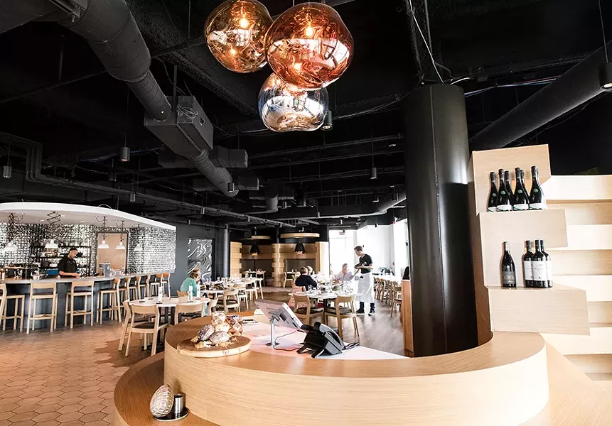 There is both traditional dining and a pastry bar where people can watch desserts being made. - MABEL SUEN
