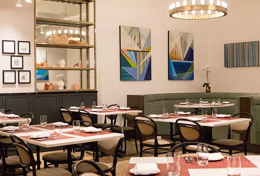 The dining room has a 1930s aesthetic befitting the space. - MABEL SUEN
