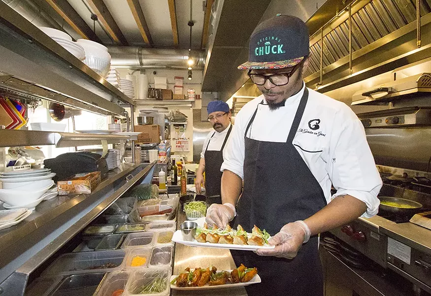 Chef Kore Wilbert works in the kitchen. - PHOTO BY MABEL SUEN