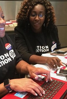 Two local attorneys from Mound City Bar Association working on voter issues on Election Day  during a past election at the St. Louis Command Center.