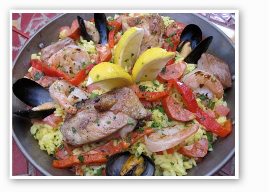 &nbsp;&nbsp;&nbsp;&nbsp;&nbsp;&nbsp;&nbsp;Paella valencia: saffron flavored calaspara rice with chicken, chorizo, shrimp and mussels. | Robin Wheeler