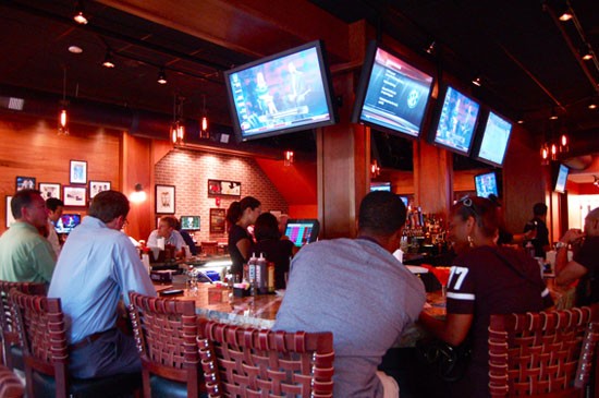 Thirty-seven TVs dot the walls and rooftop patio of Lester's. - ETTIE BERNEKING